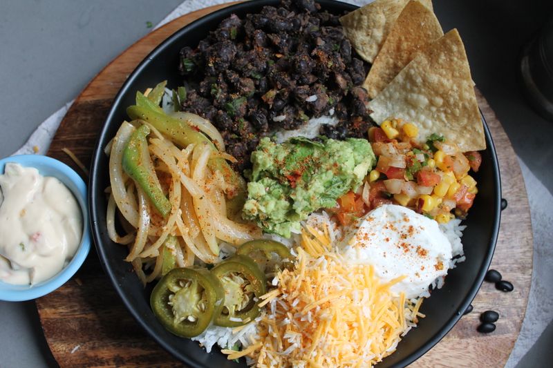 Tex-Mex burrito bowl with rice and toppings
